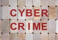 Wooden blocks form the word `cybercrime`. Beautiful wooden background