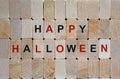 Wooden blocks form the words `happy halloween`. Beautiful wooden background. Celebrate concept Royalty Free Stock Photo