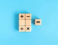 Wooden blocks forming mathematical symbols for basic arithmetic Royalty Free Stock Photo