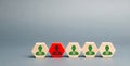 Wooden blocks with the image of workers. The concept of personnel management in the company. Dismissing an employees from a team. Royalty Free Stock Photo