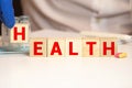 Wooden blocks with letters. Educational toy concept - children health care