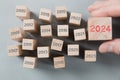 Wooden Blocks with New Year 2024.