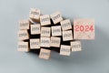 Wooden Blocks with New Year 2024.