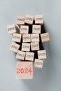 Wooden Blocks with New Year 2024.