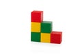 Wooden blocks, pyramid of colorful cubes, childrens toy isolated Royalty Free Stock Photo