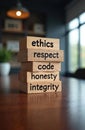 Wooden blocks stacked spell out core values ethics respect code honesty integrity. Office background implies business principles, Royalty Free Stock Photo