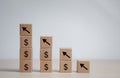 Wooden blocks stacking as step stair with arrow up and money icon, Business achievement goal and objective target concept, Ladder