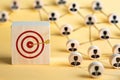 Wooden blocks with target icon represent customer focus in crm concept
