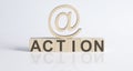 Wooden Blocks with the text: Action with wooden sign e-mail