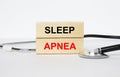 Wooden blocks with text Sleep Apnea with stethoscope