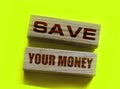 Wooden blocks with text Save Your Money. Business and finance concept Royalty Free Stock Photo