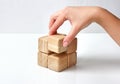 Wooden blocks on white, business concept. Royalty Free Stock Photo