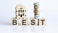 Wooden blocks with the word For BEST Real estate concept. Rent apartment