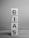 Wooden blocks with the word Bias. Prejudice. Personal opinions. Preconception