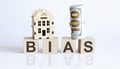 Wooden blocks with the word For BIAS Real estate concept. Rent apartment