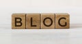 Wooden blocks with word BLOG on a light background