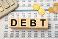 Wooden blocks with the word Debt Royalty Free Stock Photo