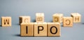 Wooden blocks with the word IPO Initial public offering; stock market launch. The first public sale of shares of a joint stock Royalty Free Stock Photo