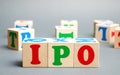 Wooden blocks with the word IPO Initial public offering; stock market launch. The first public sale of shares of a joint stock Royalty Free Stock Photo