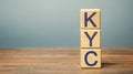 Wooden blocks with the word KYC - Know Your Customer / Client. Verify the identity, suitability and risks involved with Royalty Free Stock Photo