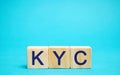 Wooden blocks with the word KYC - Know Your Customer / Client. Verify the identity, suitability and risks involved with Royalty Free Stock Photo