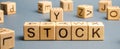 Wooden blocks with the word Stock. Trading on the stock exchange. Investment portfolio. Capital gains. Common and preferred stocks Royalty Free Stock Photo