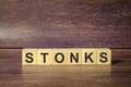 Wooden blocks with the word Stonks. Business and finance concept Royalty Free Stock Photo