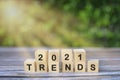 Wooden blocks with the word Trends 2021. Main trend of changing something. Popular and relevant topics. Royalty Free Stock Photo