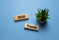Wooden blocks with the word Trends 2020. Main trend of changing something. Popular and relevant topics. New ideological trends of Royalty Free Stock Photo