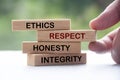 Wooden blocks with words Ethics, Respect, Honesty and Integrity. Business culture and code of conduct Royalty Free Stock Photo