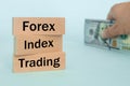 Wooden blocks with the words Forex, index, trading, Concept, non-stock currency market, money exchange of the most important world Royalty Free Stock Photo