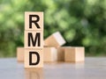 Wooden blocks with words RMD required minimum distributions Royalty Free Stock Photo