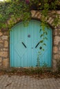 Wooden blue door of nostalgic house in Datca or Old Datca, Mugla Turkey, june 29 2023