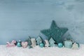 Wooden blue or mint green christmas background with decoration. Royalty Free Stock Photo