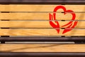 Wooden board for announcement. It shows the heart and hands. A symbol of caring for people. Coronary virus protection Royalty Free Stock Photo