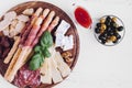 Wooden board with appetizers Royalty Free Stock Photo
