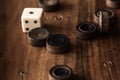 Wooden Board with backgammon, pawns, dice, close up Royalty Free Stock Photo