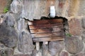 Wooden board on broken wall used in onsen