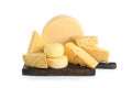 Wooden board with different kinds of cheese on white Royalty Free Stock Photo
