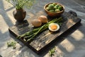 a wooden board with an egg and asparagus rolls in it Royalty Free Stock Photo