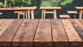 Empty wooden board table in front with blurry background Royalty Free Stock Photo