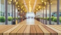 Wooden board empty table in front of blurred background. Perspective brown wood over blur in coffee shop - can be used for display Royalty Free Stock Photo