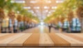 Wooden board empty table in front of blurred background. Perspective brown wood over blur in coffee shop - can be used for display Royalty Free Stock Photo