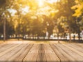 Wooden board empty table in front of blurred background. Perspective brown wood table over blur trees in forest background
