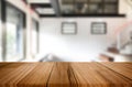Wooden board empty Table Top And Blur Interior over blur in coffee shop Background, Mock up for display of product Royalty Free Stock Photo