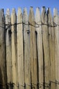 WOODEN BOARD FENCE CONNECTED BY WIRE