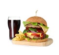 Wooden board with fresh burger, french fries and drink on white Royalty Free Stock Photo