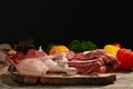 Wooden board with fresh raw meat on table Royalty Free Stock Photo