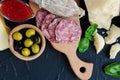 Wooden board full of mediterranean appetizers Royalty Free Stock Photo