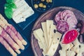 Wooden board full of mediterranean appetizers Royalty Free Stock Photo